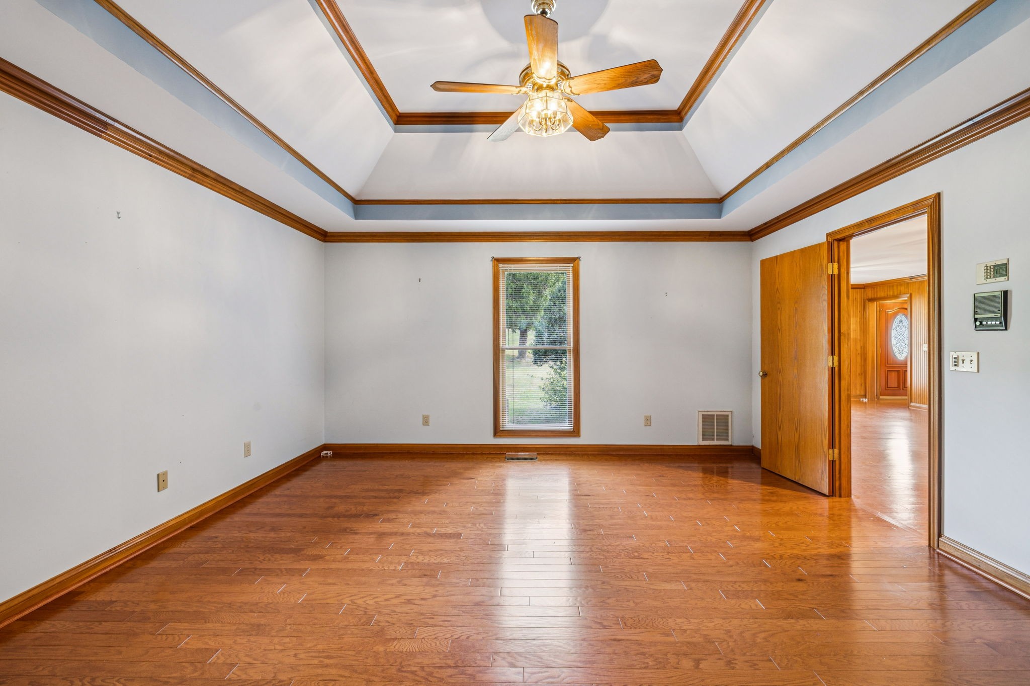 7935 Old Springfield Pike Goodlettsville, TN 37072 - Photo 47 of 82 a view of an empty room with window and wooden floor