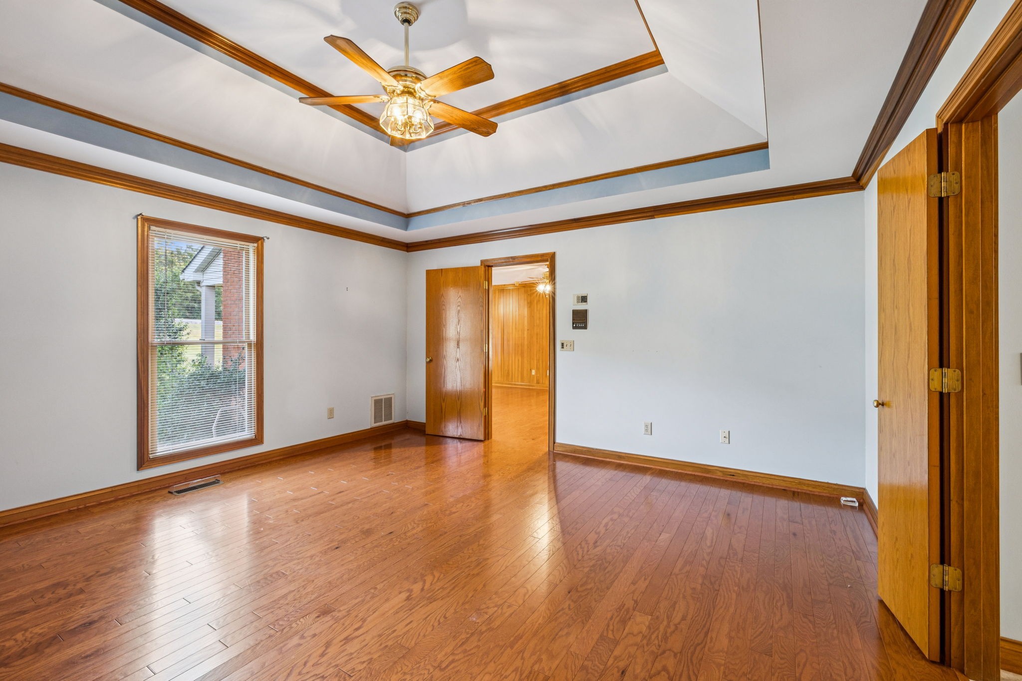7935 Old Springfield Pike Goodlettsville, TN 37072 - Photo 48 of 82 an empty room with wooden floor and a window