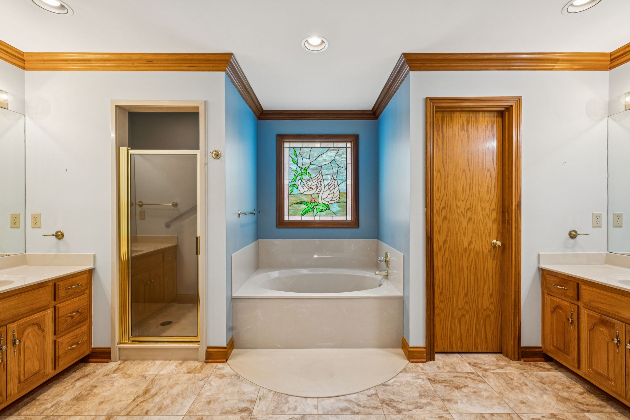 7935 Old Springfield Pike Goodlettsville, TN 37072 - Photo 49 of 82 a bathroom with a bathtub and a sink