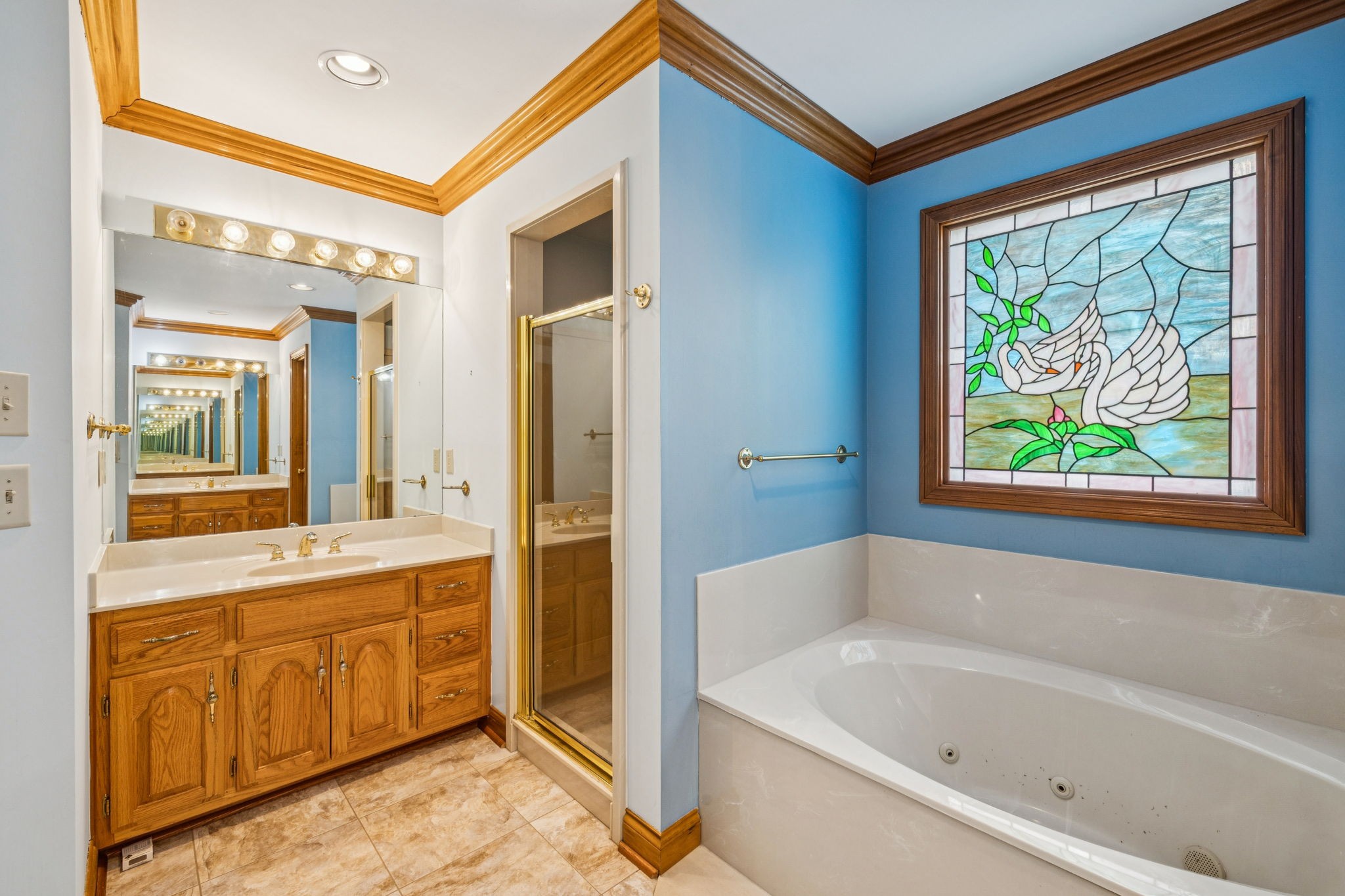 7935 Old Springfield Pike Goodlettsville, TN 37072 - Photo 50 of 82 a bathroom with a bathtub and a shower