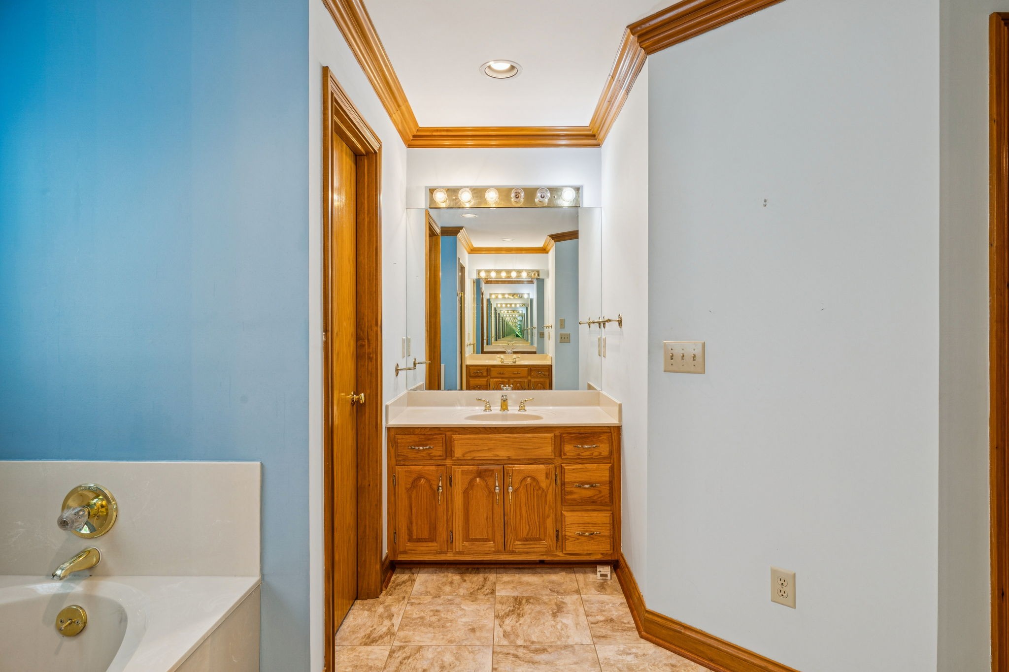 7935 Old Springfield Pike Goodlettsville, TN 37072 - Photo 51 of 82 a bathroom with a tub and a sink