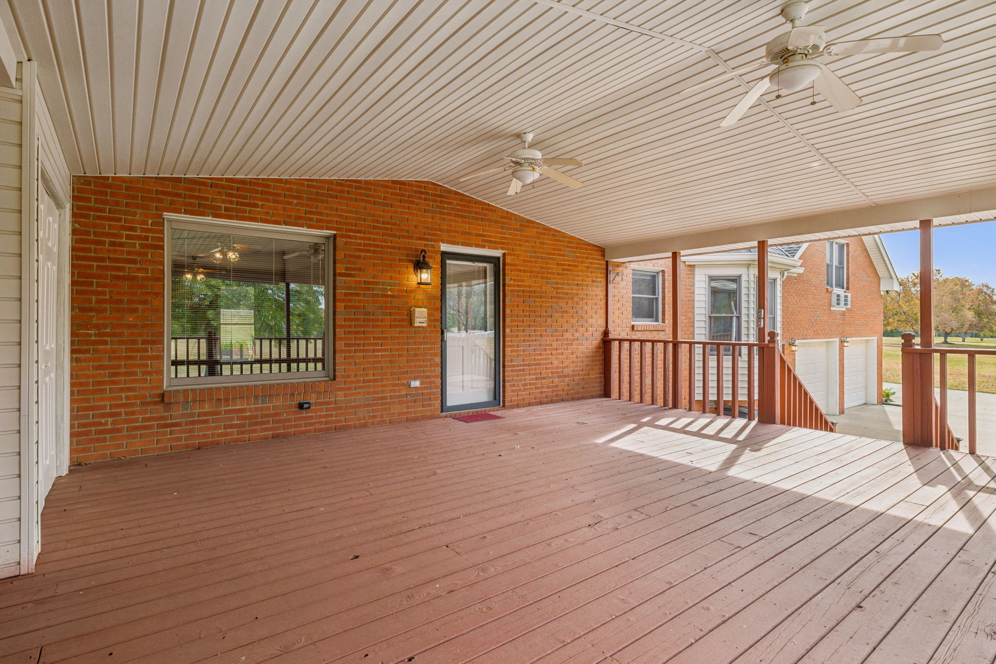 7935 Old Springfield Pike Goodlettsville, TN 37072 - Photo 59 of 82 an empty room with wooden floor and windows