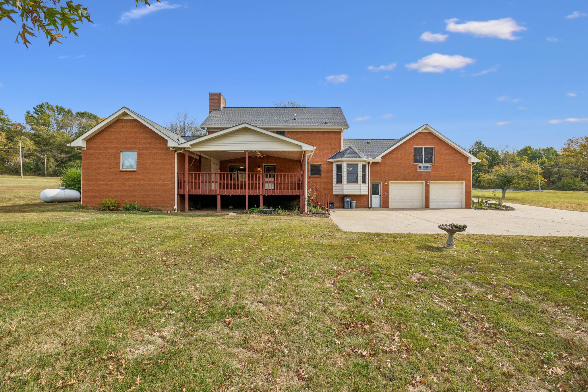 7935 Old Springfield Pike Goodlettsville, TN 37072 - Photo 63 of 82 a front view of a house with garden