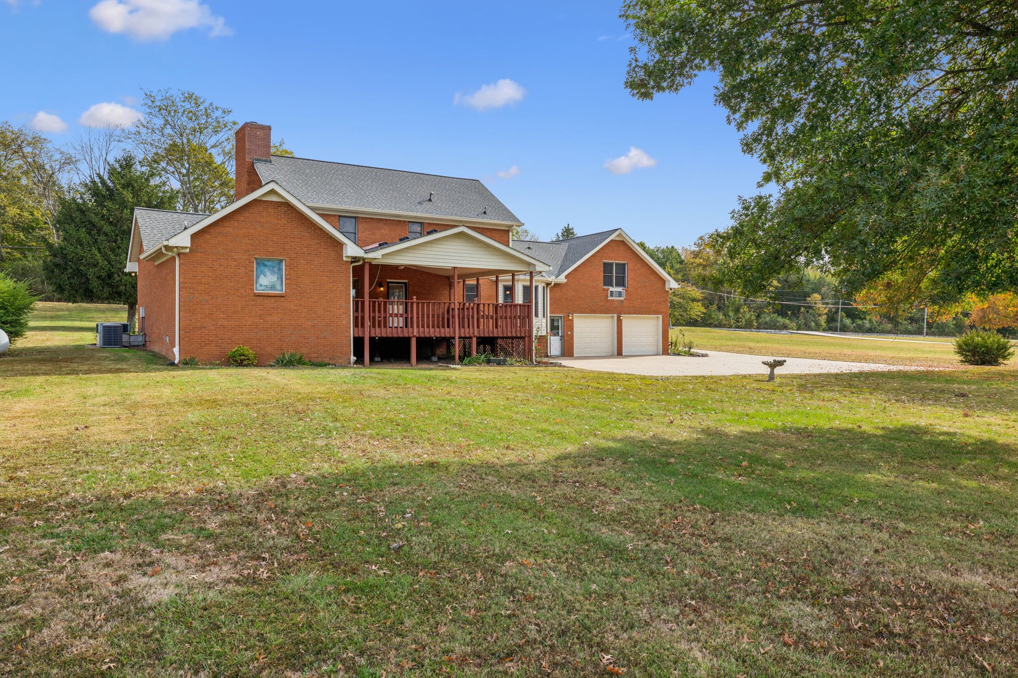 7935 Old Springfield Pike Goodlettsville, TN 37072 - Photo 66 of 82 a front view of a house with a yard and garage