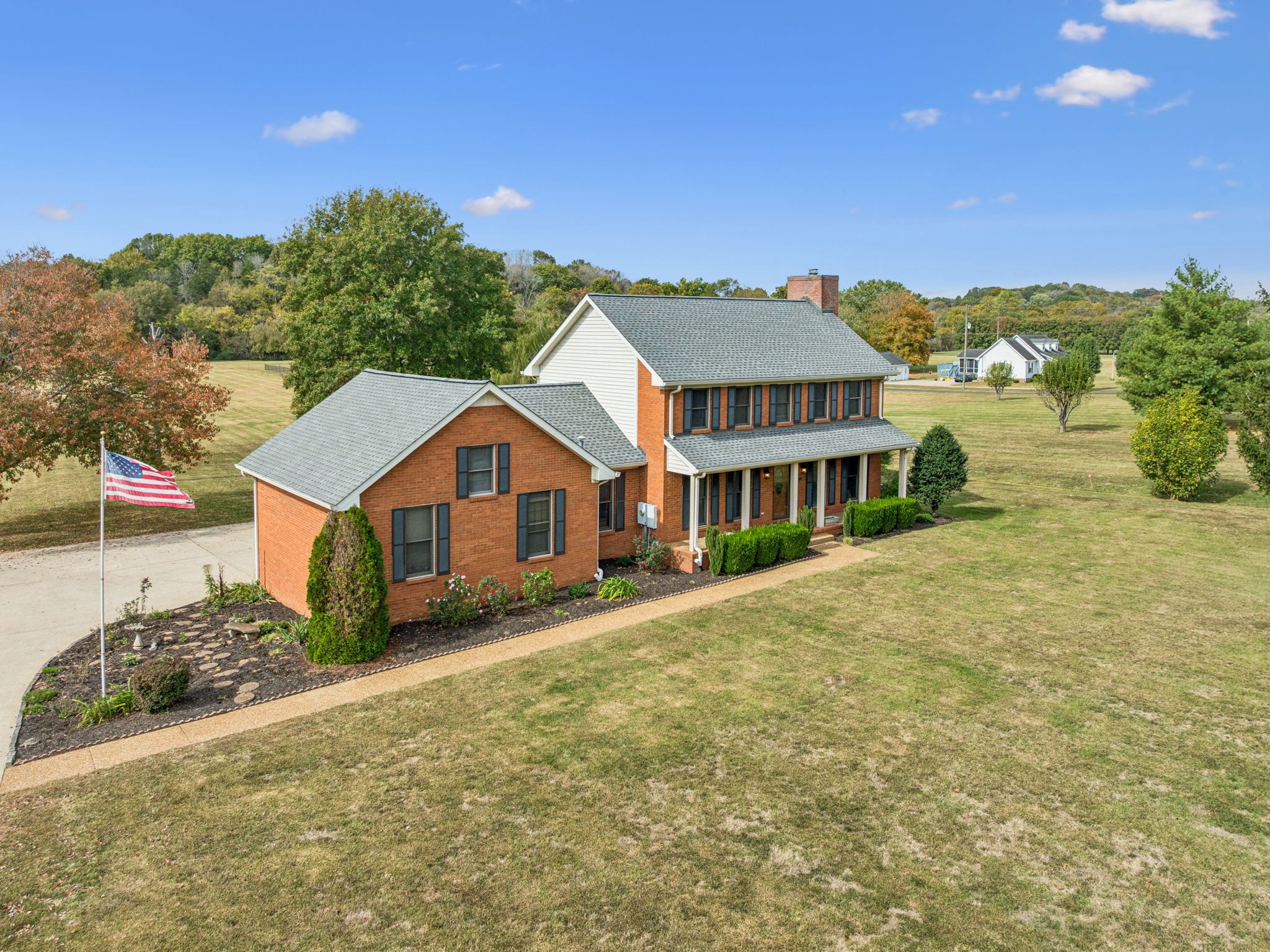 7935 Old Springfield Pike Goodlettsville, TN 37072 - Photo 68 of 82 a view of a house with a big yard and large trees