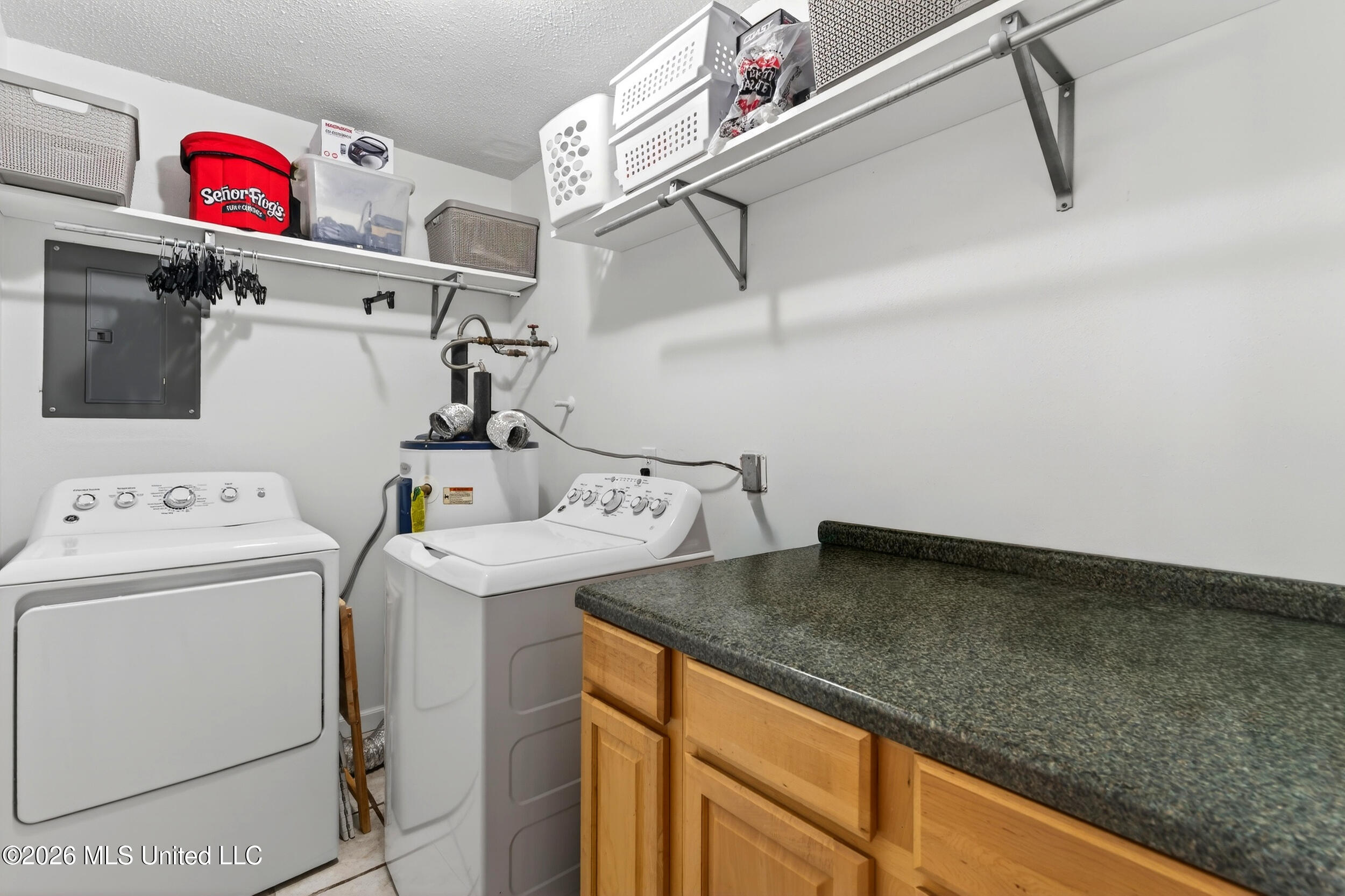 121 Edwards Drive Pass Christian, MS 39571 - Photo 29 of 51 24_laundry