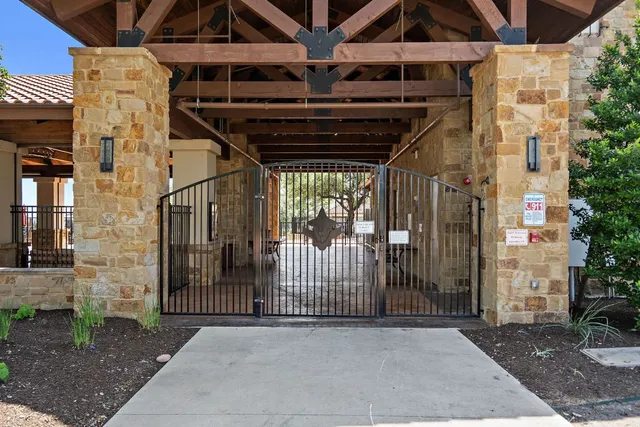 a view of a playground with basketball court