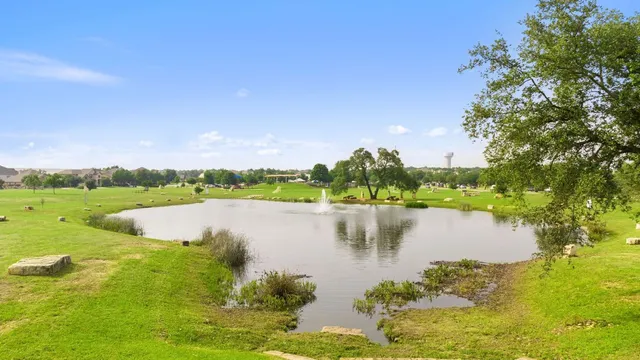 a view of a bench in a garden