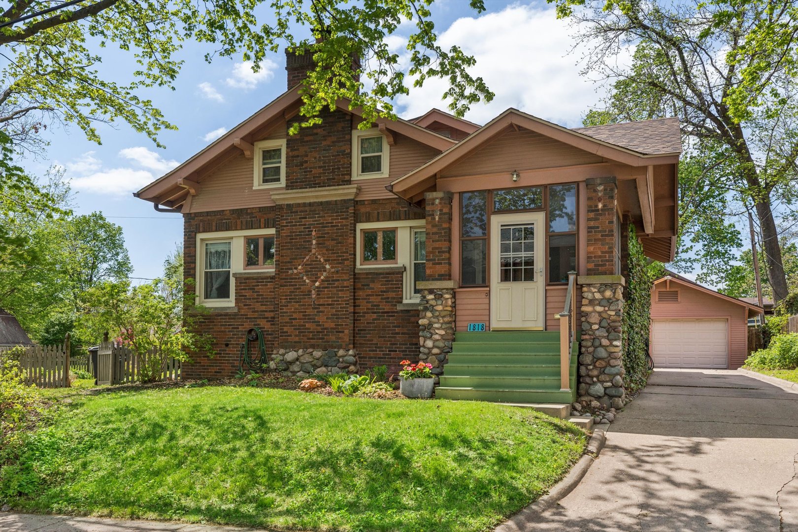 1818 23rd Street Rock Island, IL 61201 - Photo 1 of 55 a front view of a house with garden