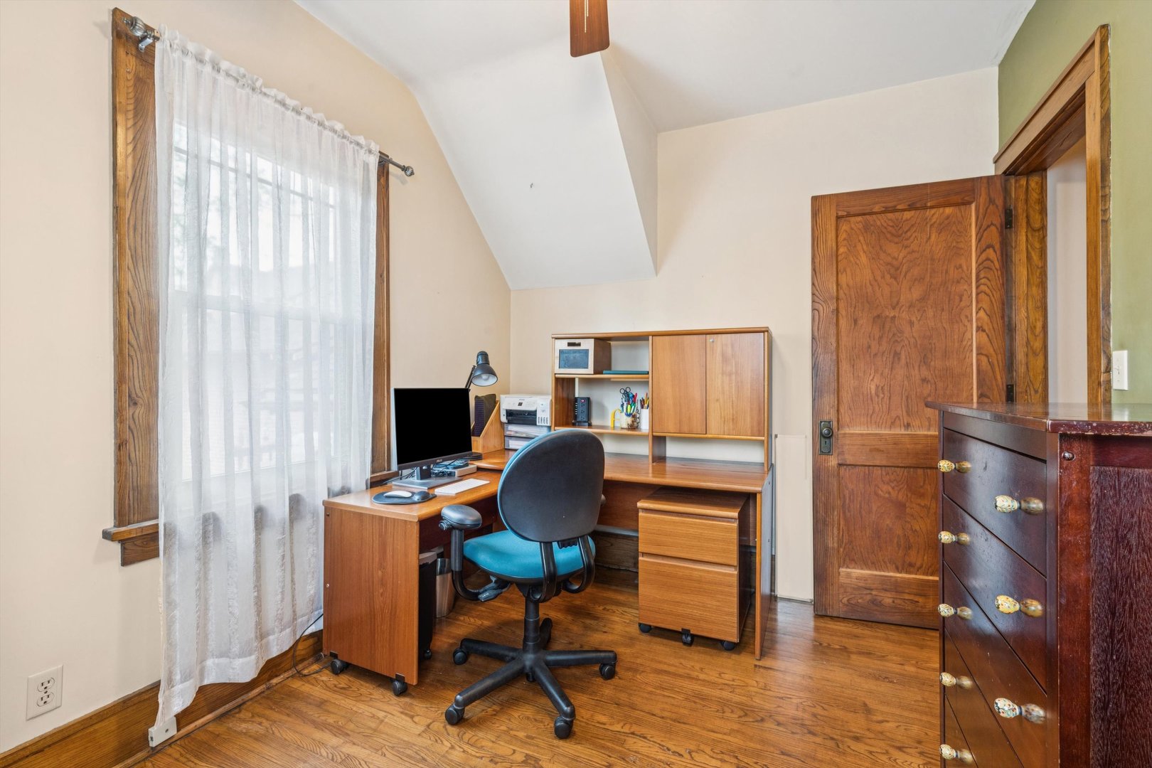 1818 23rd Street Rock Island, IL 61201 - Photo 27 of 55 a view of a workspace with furniture and a window