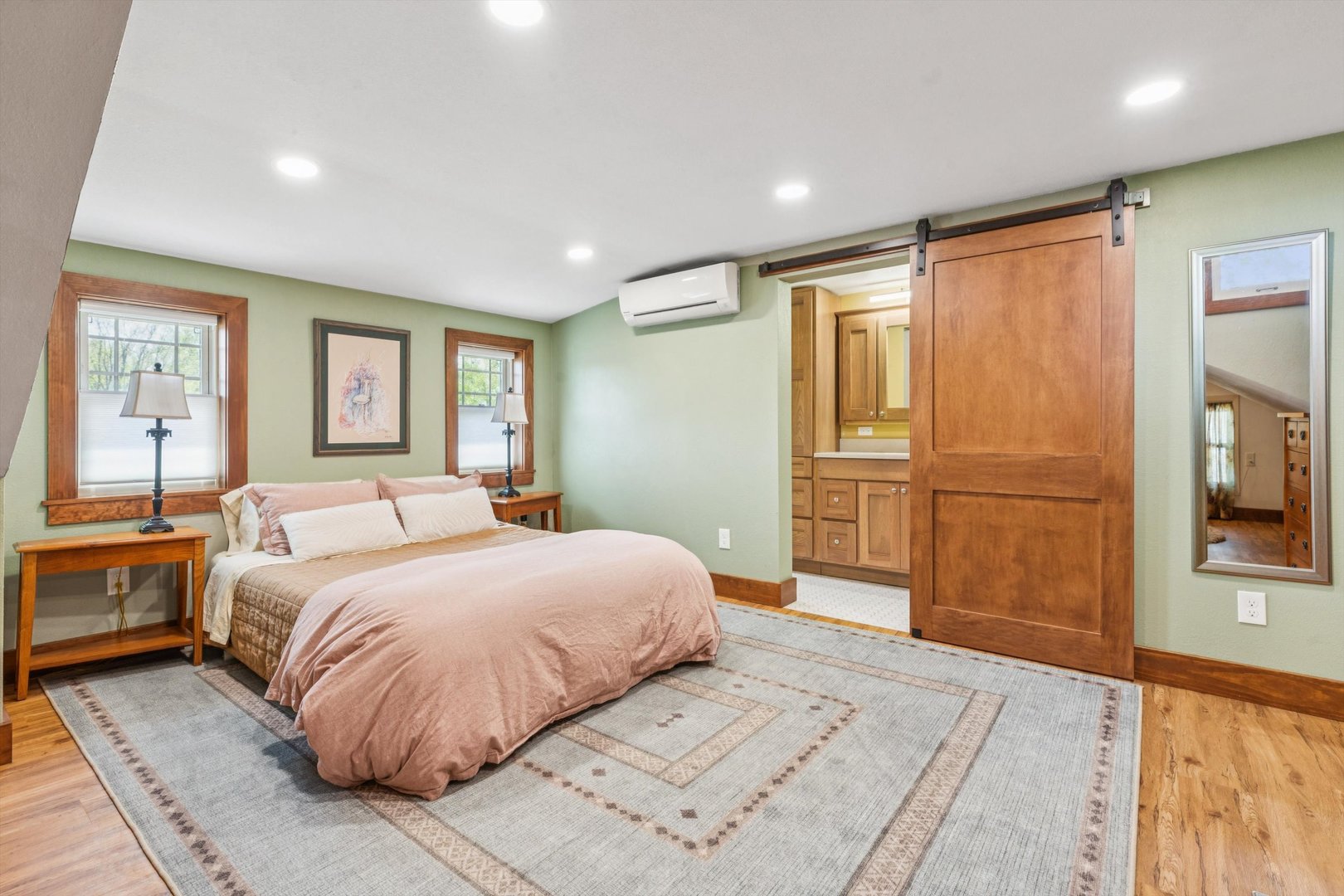 1818 23rd Street Rock Island, IL 61201 - Photo 30 of 55 a bedroom with a large bed and a closet