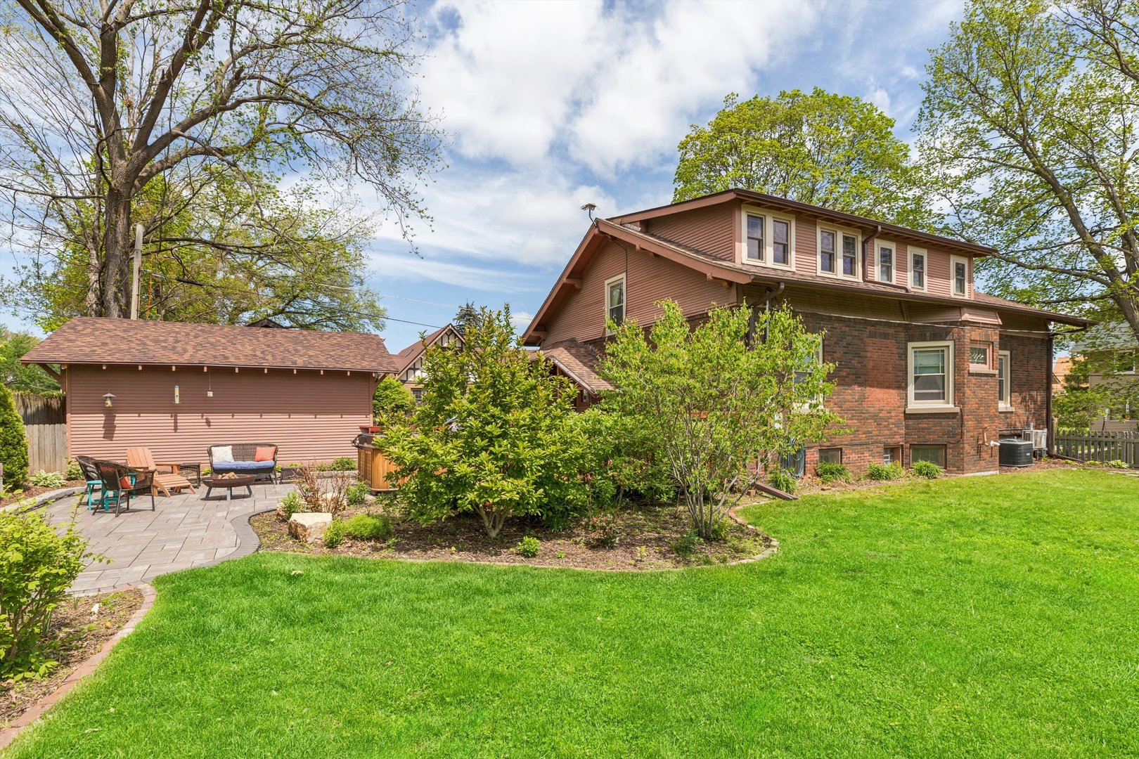 1818 23rd Street Rock Island, IL 61201 - Photo 48 of 55 a front view of a house with a garden