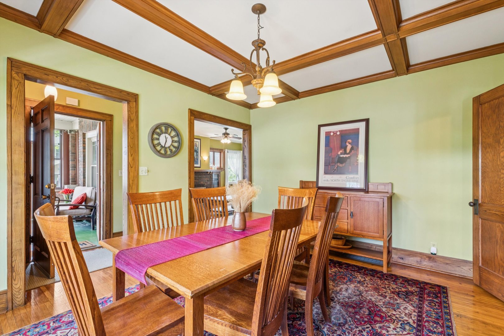 1818 23rd Street Rock Island, IL 61201 - Photo 6 of 55 a view of a dining room with furniture and wooden floor
