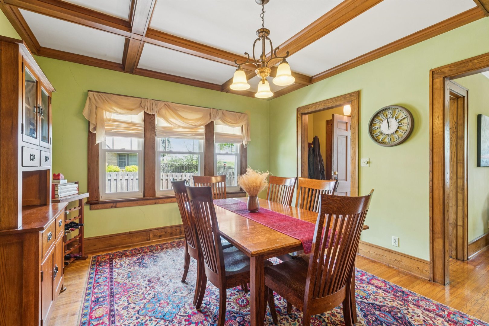1818 23rd Street Rock Island, IL 61201 - Photo 7 of 55 a view of a dining room with furniture window and wooden floor