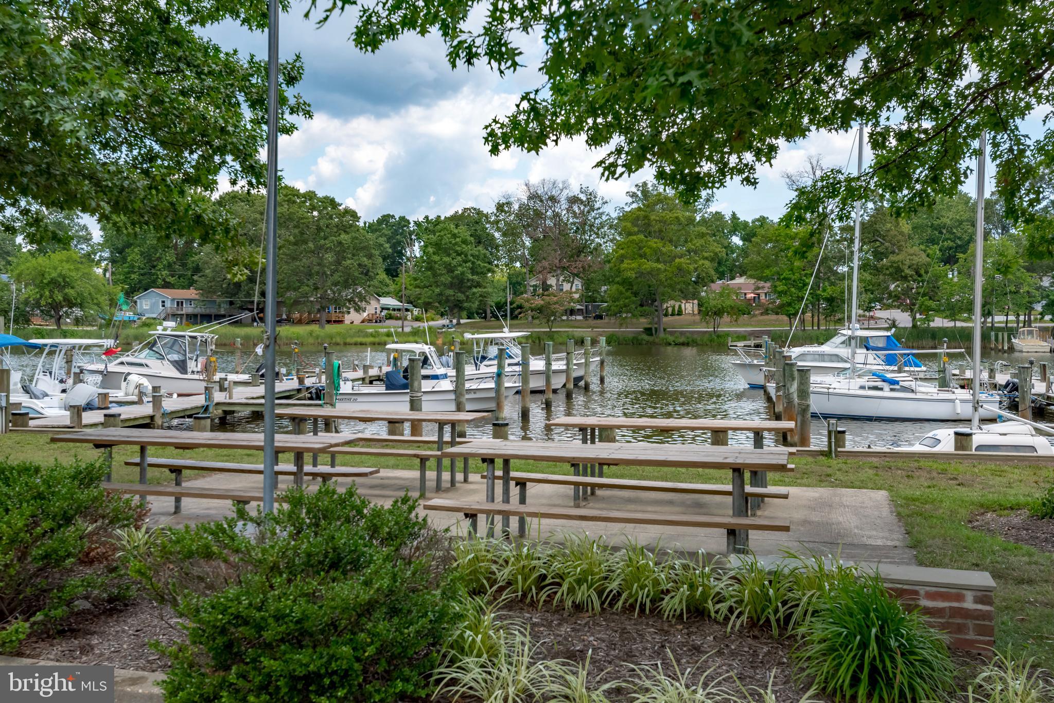 534 Londontown Road Edgewater, MD 21037 - Photo 52 of 59 a view of a lake with sitting area