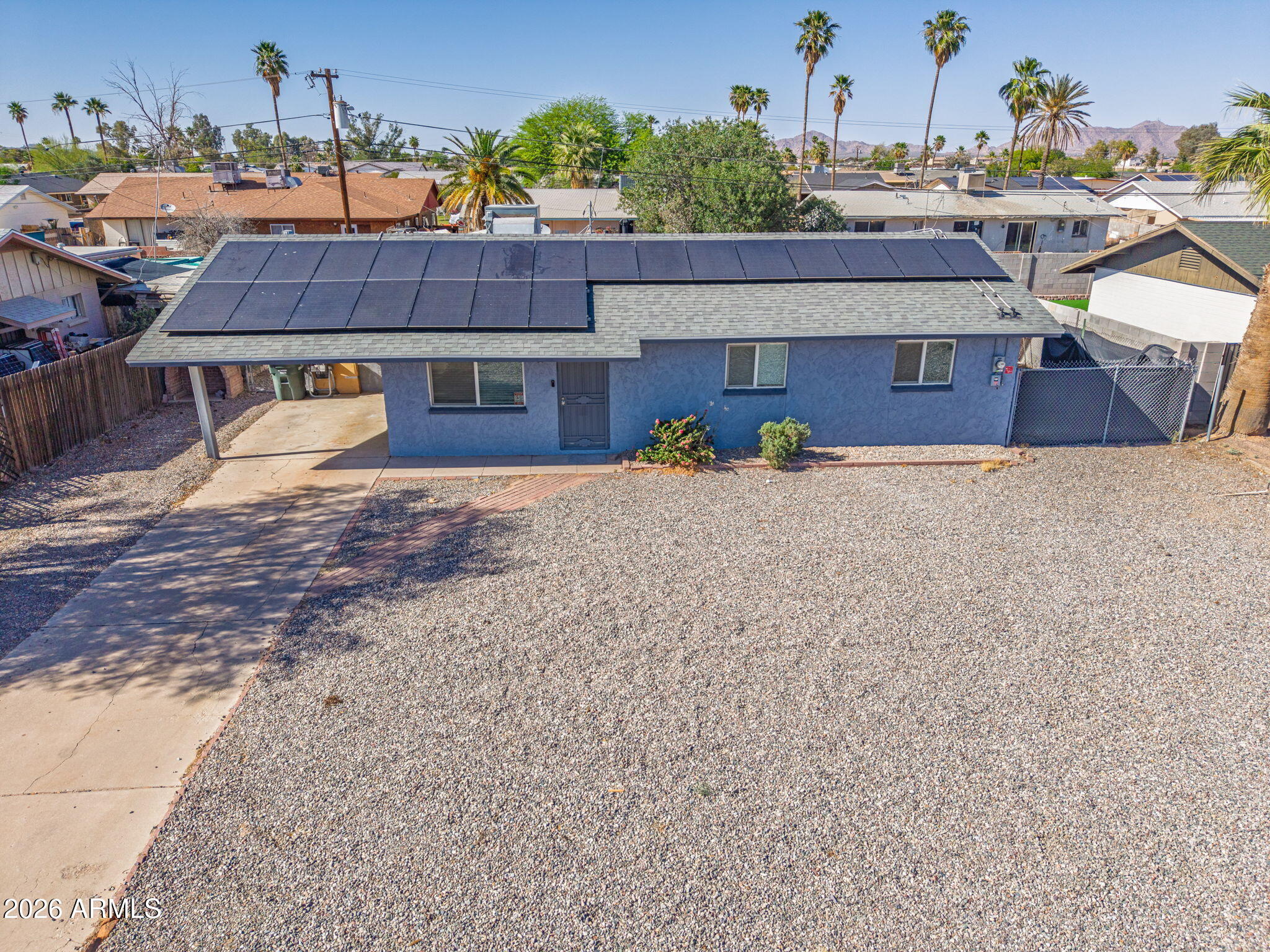 1268 East Rodeo Road Casa Grande, AZ 85122 - Photo 5 of 27 an aerial view of a house with a yard