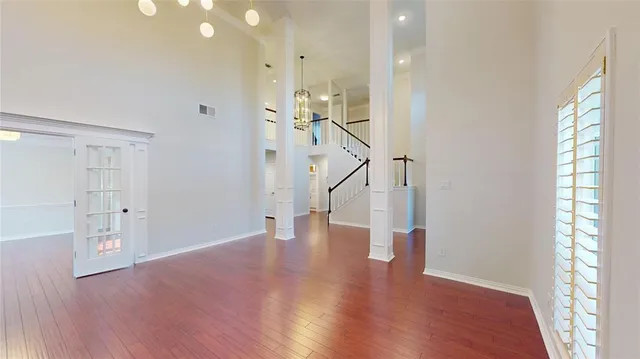 a view of entryway with wooden floor
