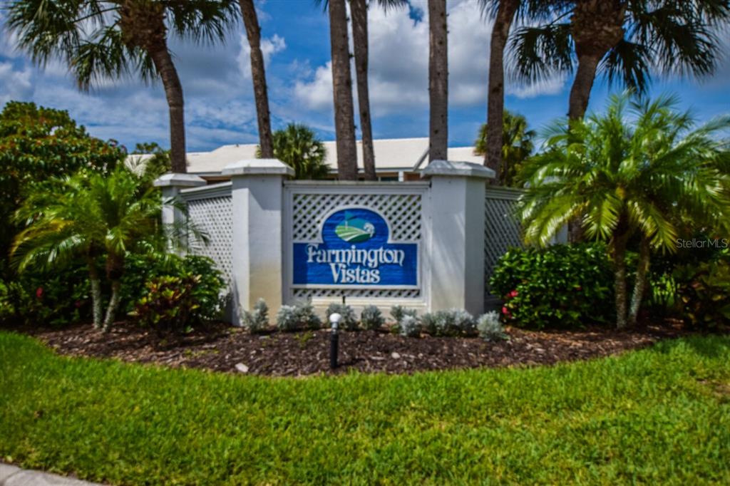 433 Cerromar Lane, Unit 438 Venice, FL 34293 - Photo 27 of 44 a sign that is sitting in front of a house