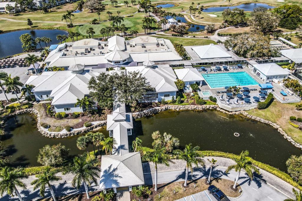 433 Cerromar Lane, Unit 438 Venice, FL 34293 - Photo 29 of 44 an aerial view of residential houses with outdoor space