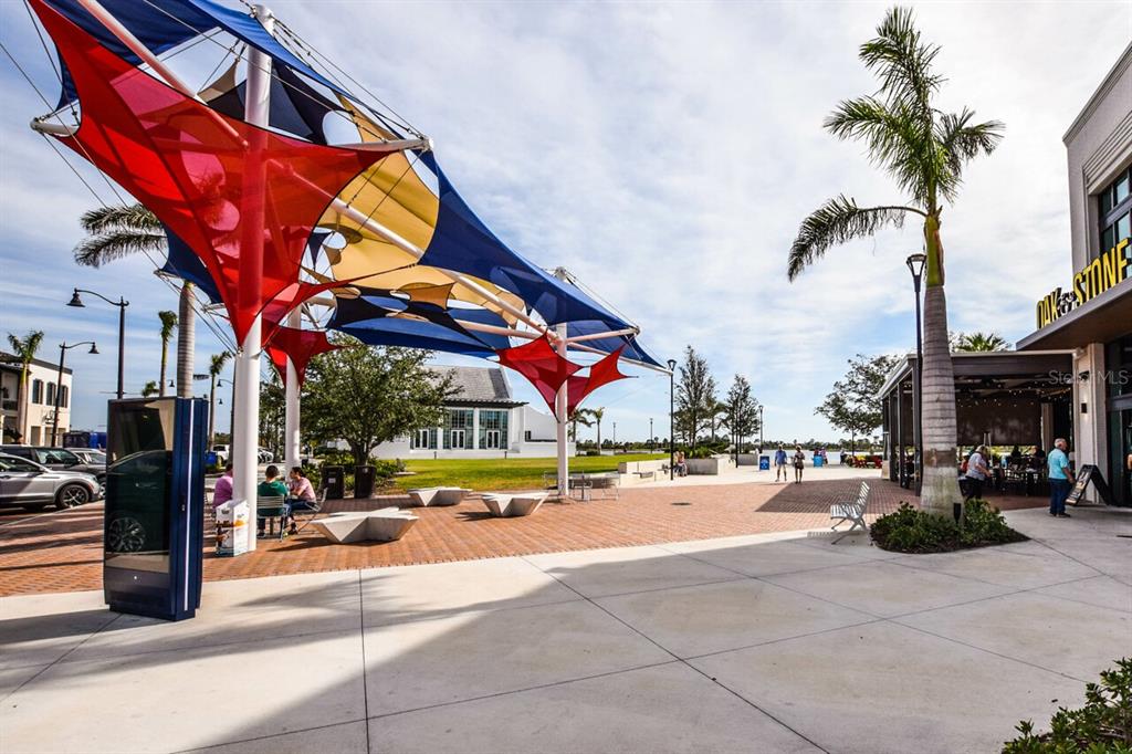 433 Cerromar Lane, Unit 438 Venice, FL 34293 - Photo 43 of 44 a view of a street with cars