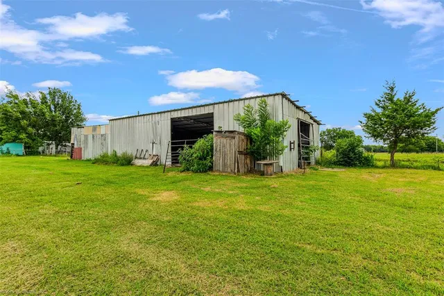 a front view of house with garden