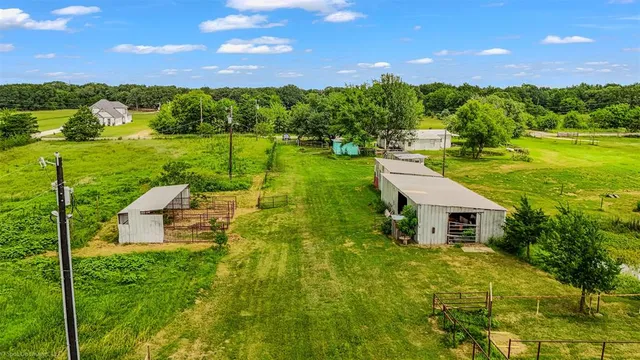 a view of a golf course with a big yard