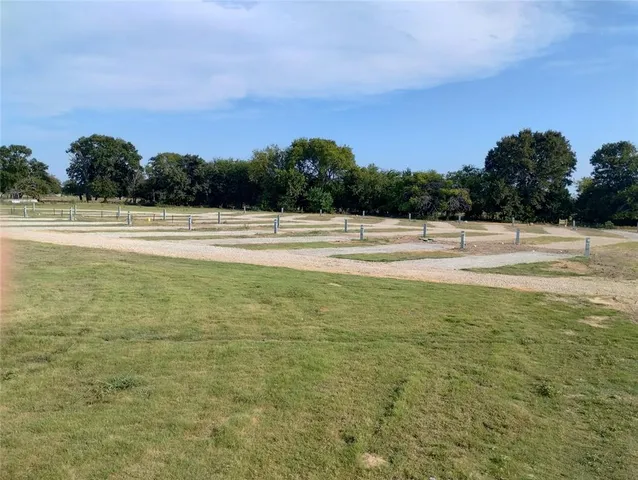 a view of lake with green space