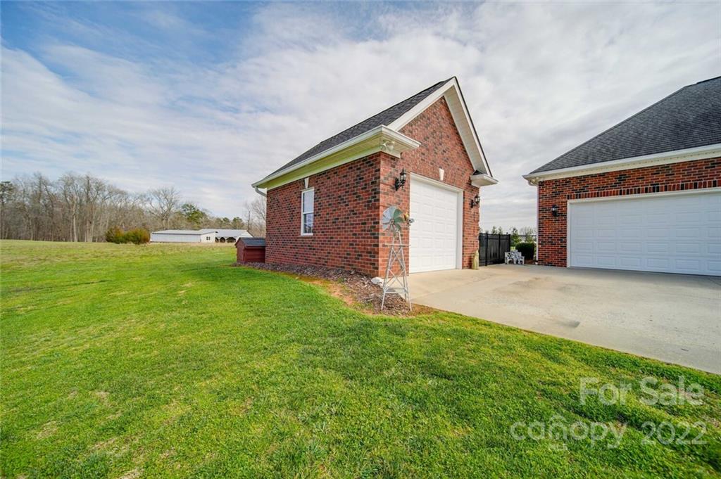 155 St Peters Church Road Gold Hill, NC 28071 - Photo 12 of 47 a view of a backyard of the house