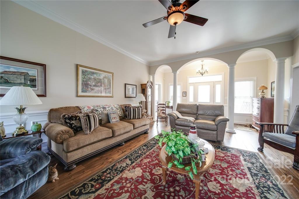 155 St Peters Church Road Gold Hill, NC 28071 - Photo 15 of 47 a living room with furniture and a large window