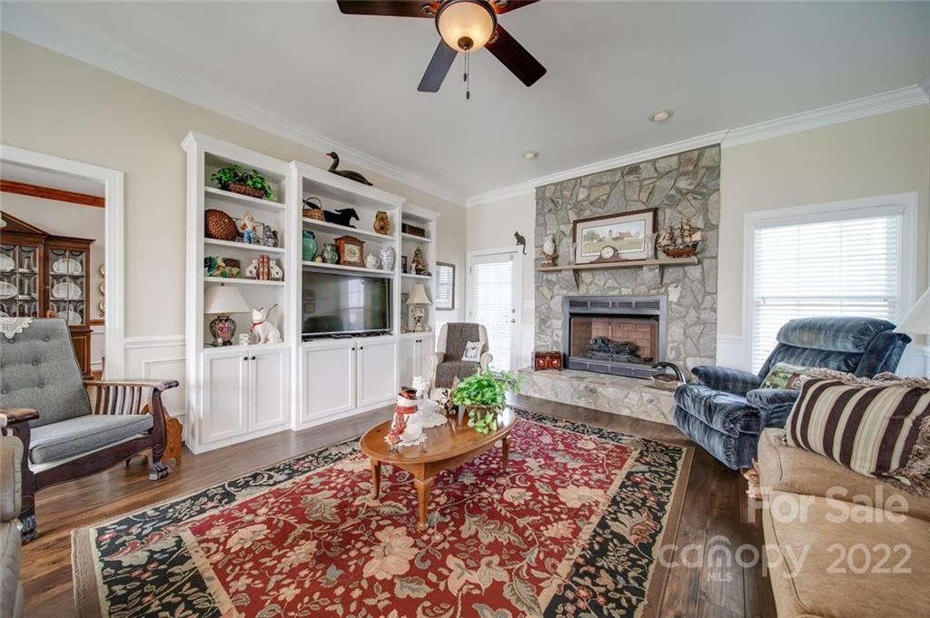 155 St Peters Church Road Gold Hill, NC 28071 - Photo 16 of 47 a living room with furniture and a fireplace