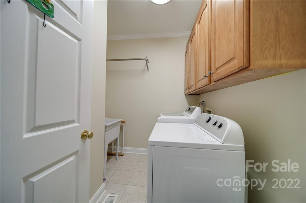155 St Peters Church Road Gold Hill, NC 28071 - Photo 26 of 47 a utility room with dryer and washer
