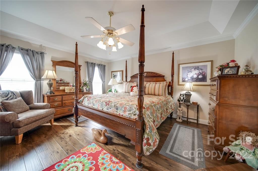 155 St Peters Church Road Gold Hill, NC 28071 - Photo 28 of 47 a bedroom with a bed couch and window