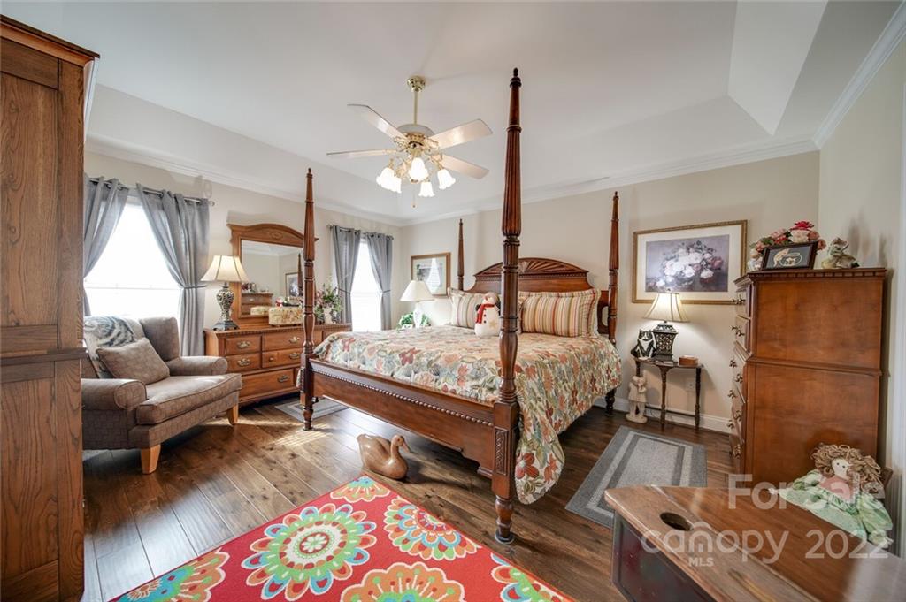 155 St Peters Church Road Gold Hill, NC 28071 - Photo 29 of 47 a bedroom with a bed mirror and a window