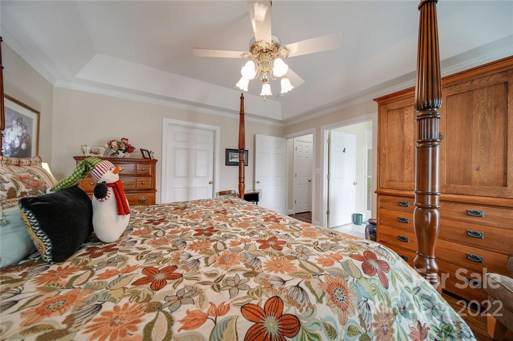 155 St Peters Church Road Gold Hill, NC 28071 - Photo 30 of 47 a bedroom with a bed and a dresser