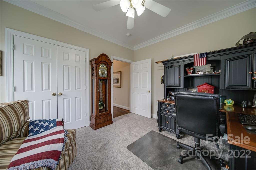 155 St Peters Church Road Gold Hill, NC 28071 - Photo 35 of 47 a view of a livingroom with workspace and a couch