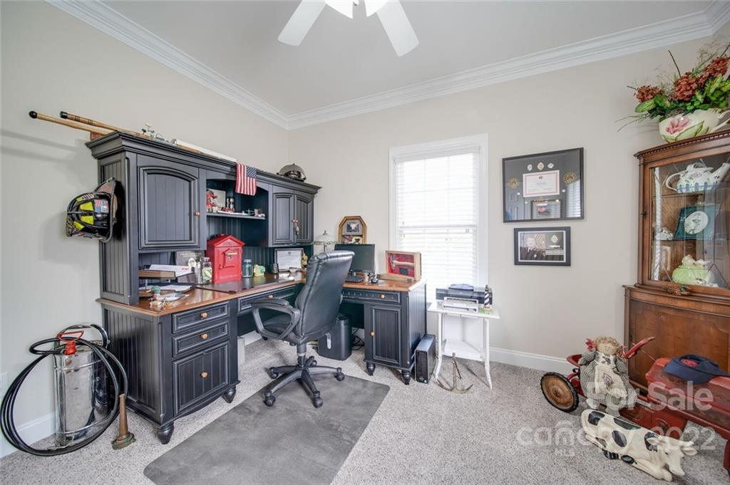 155 St Peters Church Road Gold Hill, NC 28071 - Photo 36 of 47 a view of a workspace with a window and storage