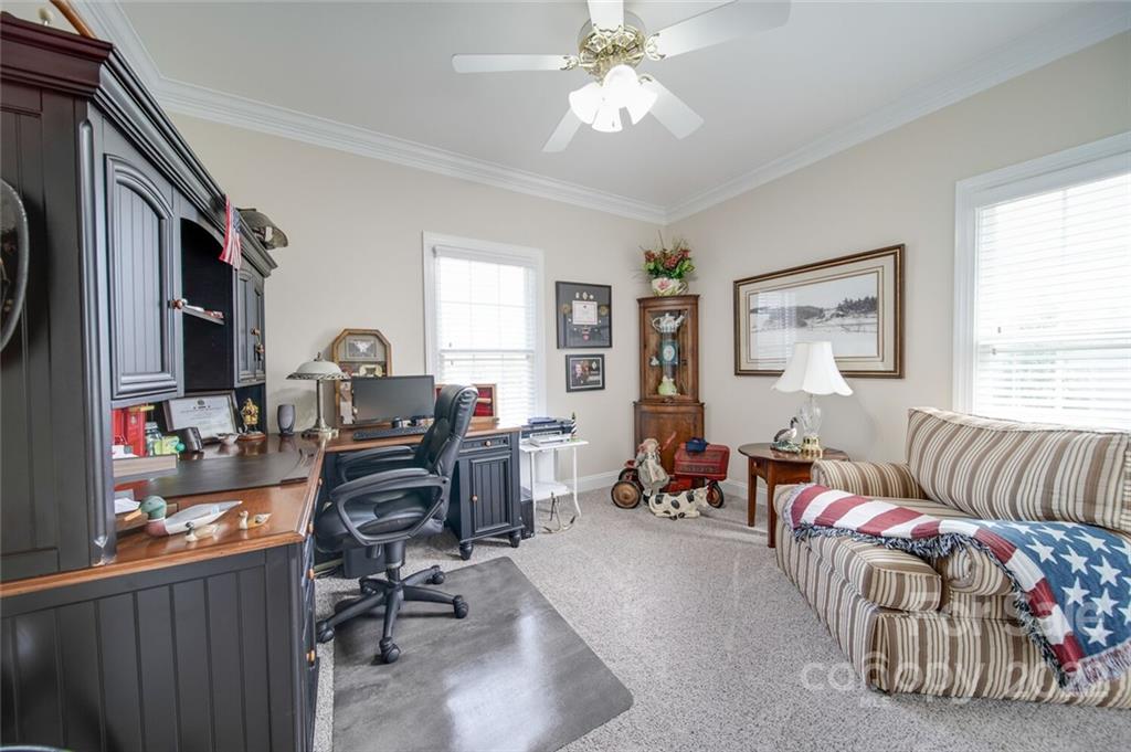 155 St Peters Church Road Gold Hill, NC 28071 - Photo 37 of 47 a living room with furniture and a window
