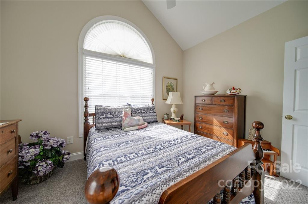 155 St Peters Church Road Gold Hill, NC 28071 - Photo 39 of 47 a bedroom with a bed and a dresser
