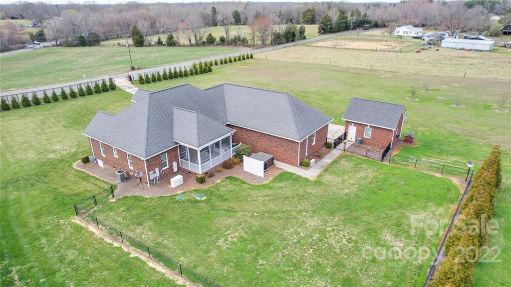 155 St Peters Church Road Gold Hill, NC 28071 - Photo 4 of 47 an aerial view of a house with garden