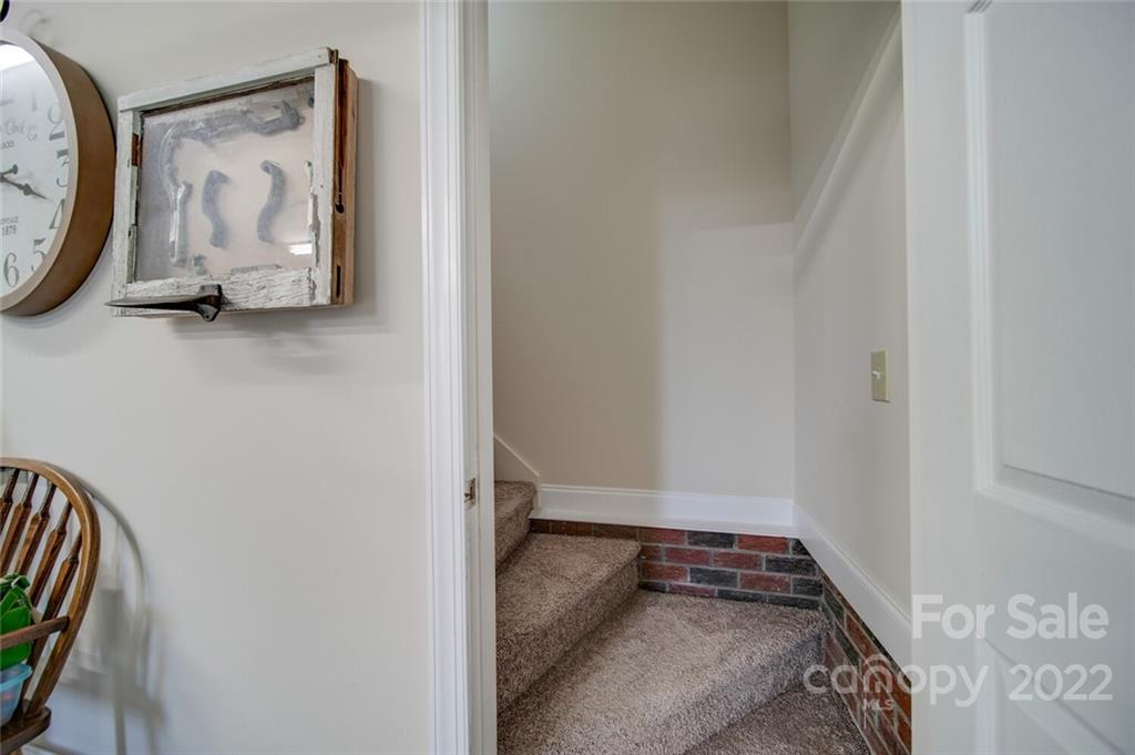 155 St Peters Church Road Gold Hill, NC 28071 - Photo 43 of 47 a view of room with wooden floor and wall painting