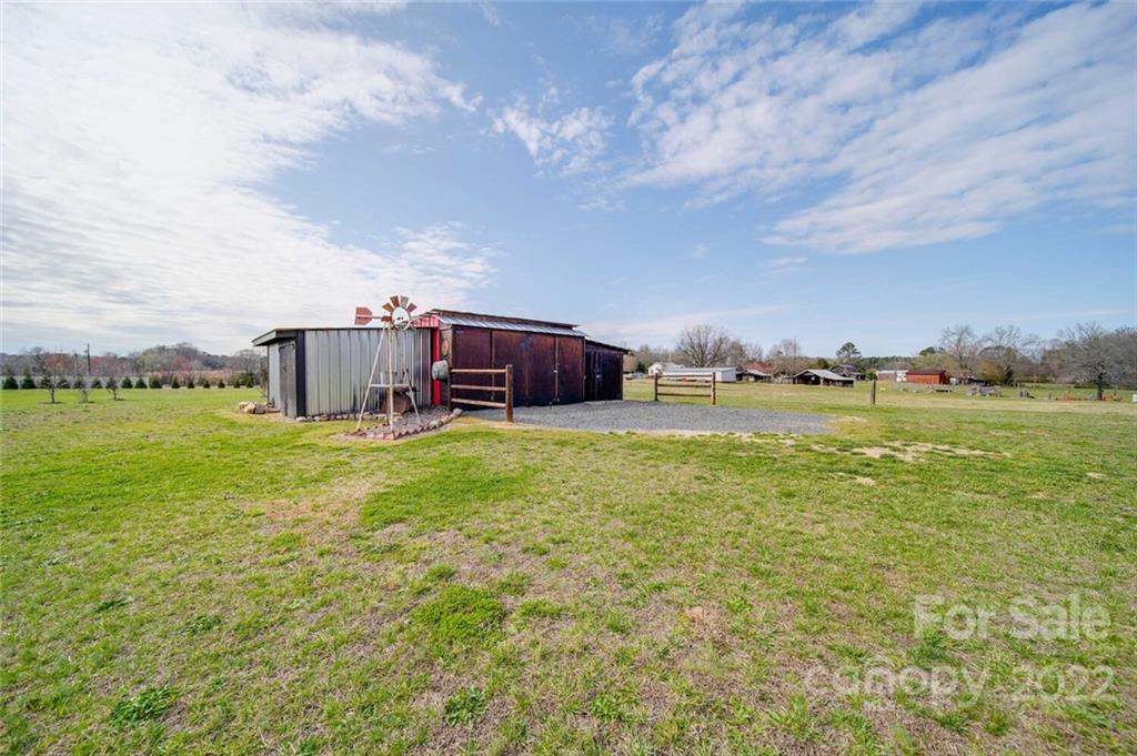155 St Peters Church Road Gold Hill, NC 28071 - Photo 47 of 47 a view of a big house with a big yard and large trees