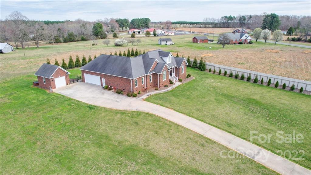 155 St Peters Church Road Gold Hill, NC 28071 - Photo 6 of 47 an aerial view of a house with big yard and large trees