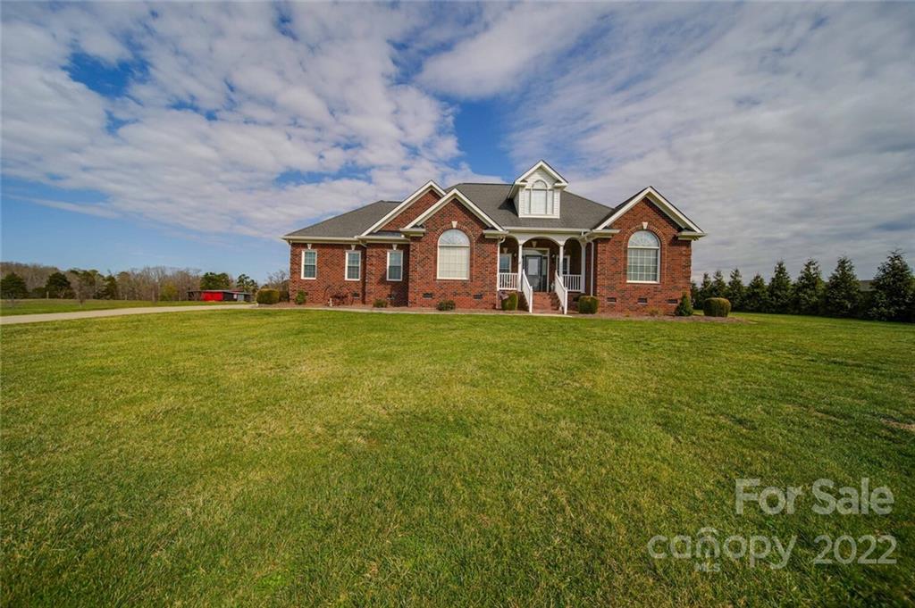 155 St Peters Church Road Gold Hill, NC 28071 - Photo 10 of 47 a view of a house with a big yard and large trees