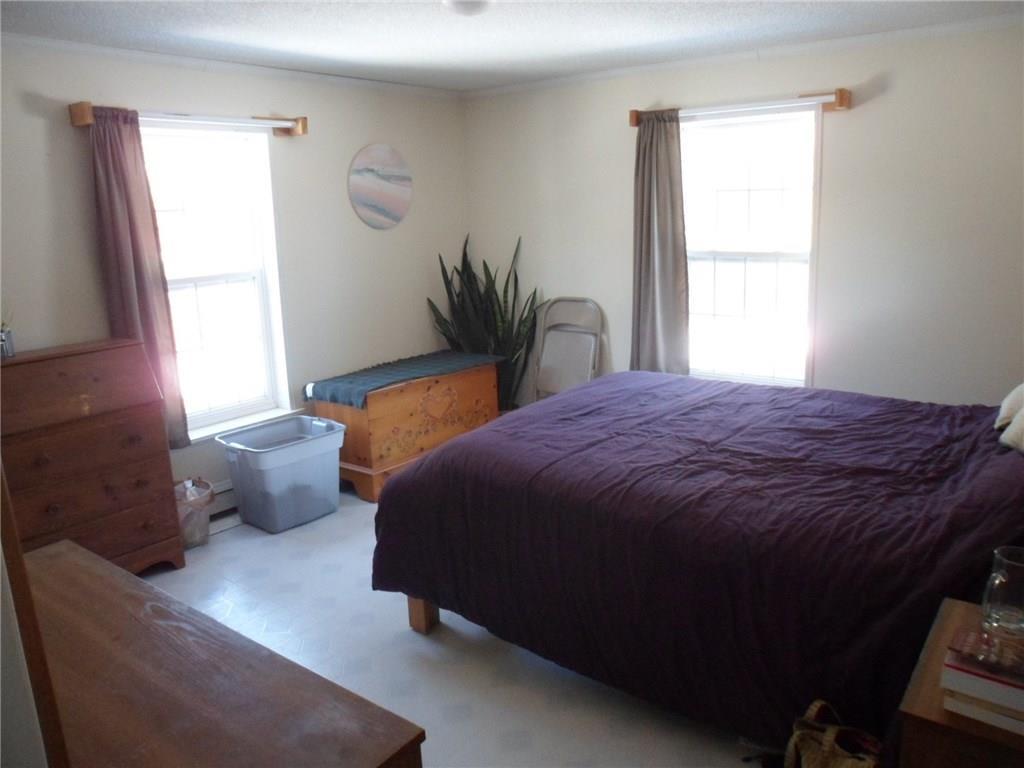 56 Bowen Road Searsport, ME 04974 - Photo 9 of 17 Master bedroom has large walk-in...
