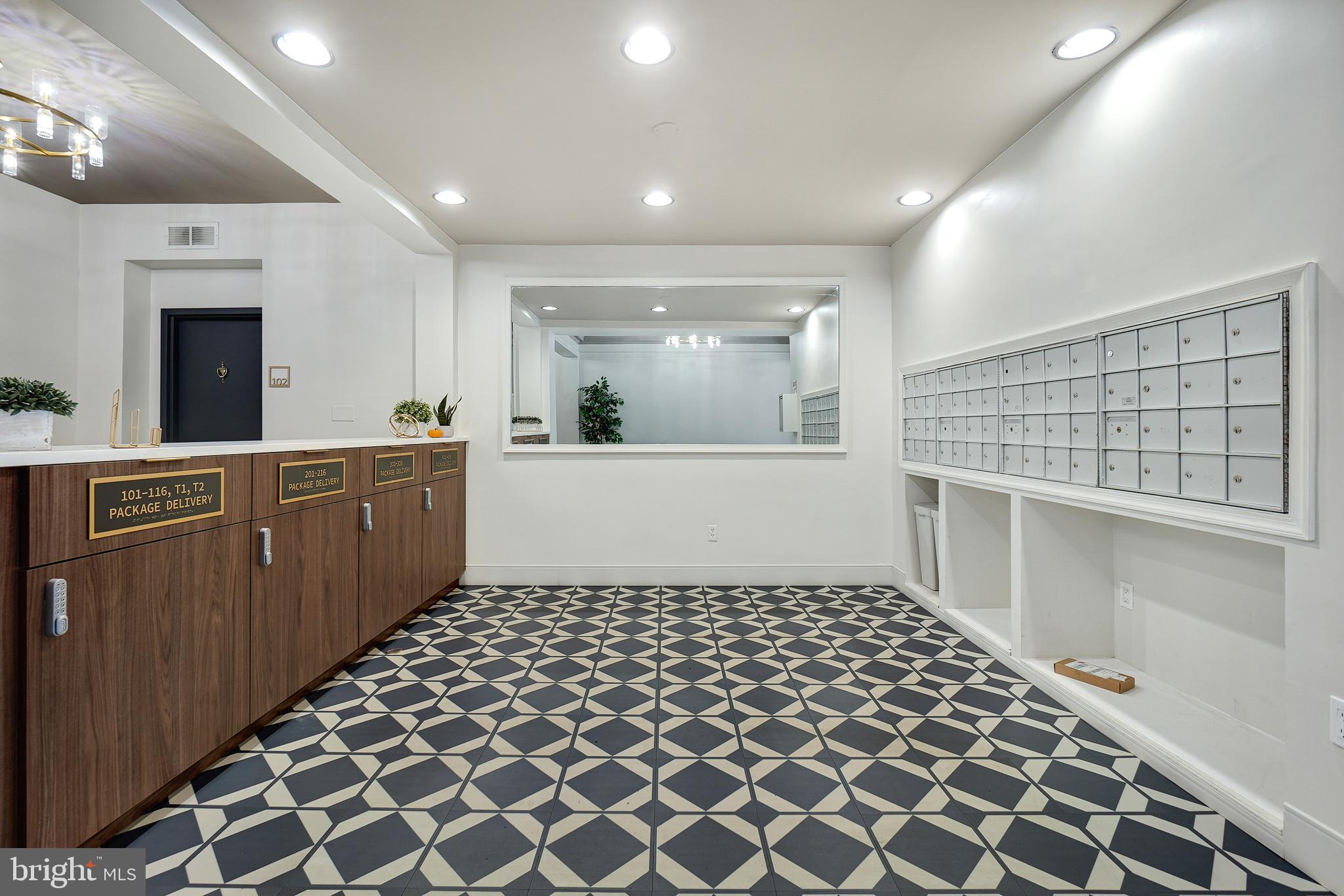 1669 Columbia Road Northwest, Unit 411 Washington, DC 20009 - Photo 5 of 53 Renovated mail and secure package area