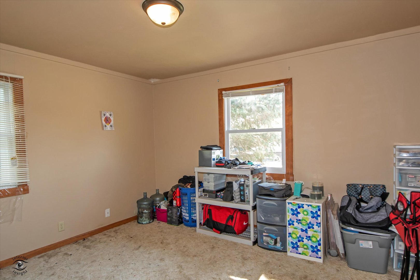 128 North Pinecrest Road Bolingbrook, IL 60440 - Photo 16 of 25 a room with furniture and a window