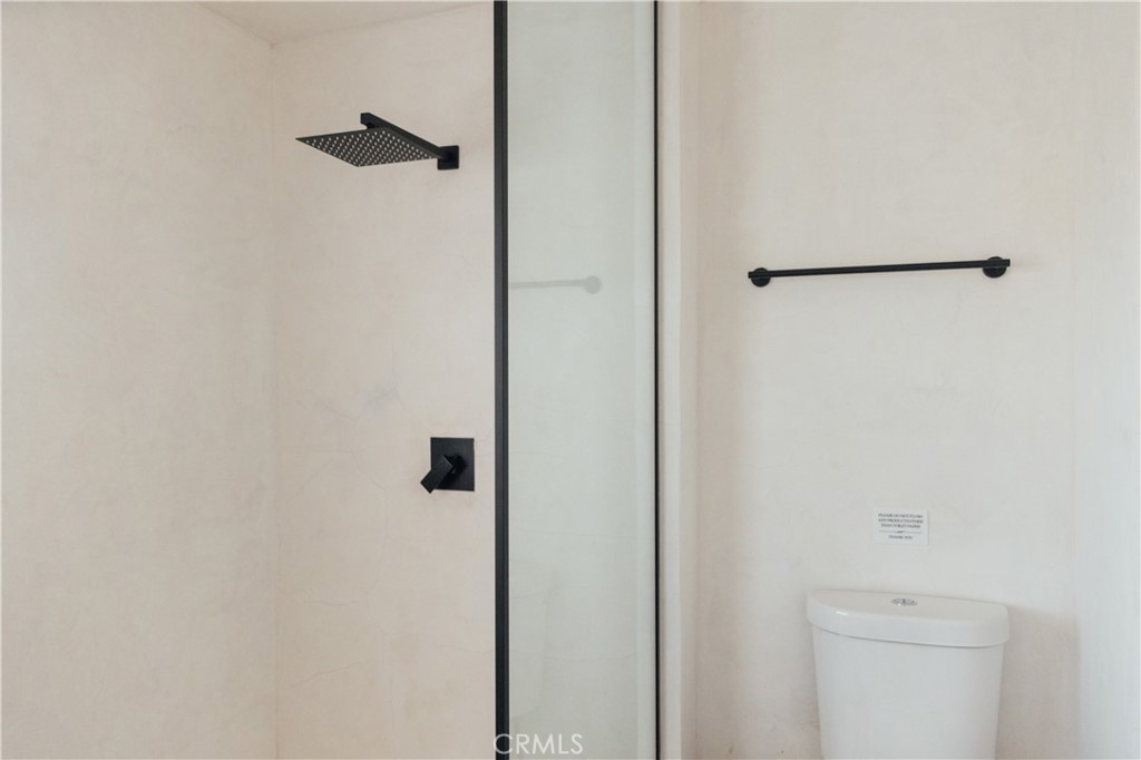 75243 Sullivan Road Twentynine Palms, CA 92277 - Photo 24 of 62 a bathroom with a shower