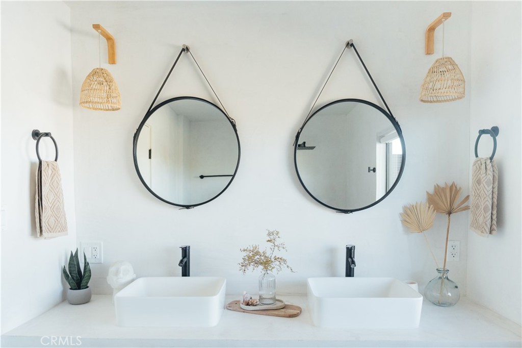 75243 Sullivan Road Twentynine Palms, CA 92277 - Photo 25 of 62 a bathroom with a sink and a mirror