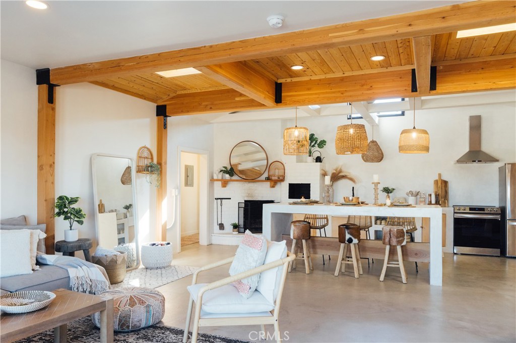 75243 Sullivan Road Twentynine Palms, CA 92277 - Photo 5 of 62 a dining room with furniture and wooden floor