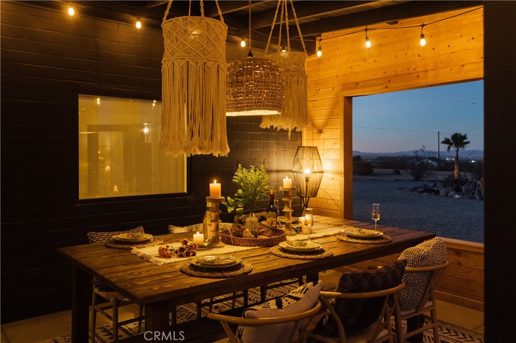 75243 Sullivan Road Twentynine Palms, CA 92277 - Photo 61 of 62 a view of an outside dining space with furniture